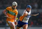28 October 2024; Steven Conway of Feakle is tackled by Noel Purcell of Sixmilebridge during the Clare County Senior Club Hurling Championship final match between Sixmilebridge and Feakle at Cusack Park in Clare. Photo by Ray McManus/Sportsfile
