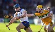 28 October 2024; Noel Purcell of Sixmilebridge in action against Patrick Daly of Feakle during the Clare County Senior Club Hurling Championship final match between Sixmilebridge and Feakle at Cusack Park in Clare. Photo by John Sheridan/Sportsfile