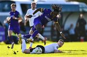 28 October 2024; Thomas Oluwa of Wexford is fouled by Dylan Hand of Athlone Town during the SSE Airtricity Men's First Division Play-Off semi-final second leg match between Wexford and Athlone Town at Ferrycarrig Park in Wexford. Photo by Shauna Clinton/Sportsfile