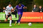 28 October 2024; Thomas Oluwa of Wexford in action against Oisin Duffy of Athlone Town during the SSE Airtricity Men's First Division Play-Off semi-final second leg match between Wexford and Athlone Town at Ferrycarrig Park in Wexford. Photo by Shauna Clinton/Sportsfile