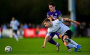 28 October 2024; Dylan Hand of Athlone Town in action against Aaron Dobbs of Wexford during the SSE Airtricity Men's First Division Play-Off semi-final second leg match between Wexford and Athlone Town at Ferrycarrig Park in Wexford. Photo by Shauna Clinton/Sportsfile