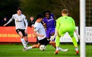 28 October 2024; Thomas Oluwa of Wexford has a shot on goal blocked by German Fuentes Rodriguez of Athlone Town during the SSE Airtricity Men's First Division Play-Off semi-final second leg match between Wexford and Athlone Town at Ferrycarrig Park in Wexford. Photo by Shauna Clinton/Sportsfile