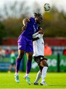 28 October 2024; Divin Isamala of Wexford in action against Gideon Tetteh of Athlone Town during the SSE Airtricity Men's First Division Play-Off semi-final second leg match between Wexford and Athlone Town at Ferrycarrig Park in Wexford. Photo by Shauna Clinton/Sportsfile