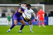 28 October 2024; Gideon Tetteh of Athlone Town in action against Lewis Temple of Wexford during the SSE Airtricity Men's First Division Play-Off semi-final second leg match between Wexford and Athlone Town at Ferrycarrig Park in Wexford. Photo by Shauna Clinton/Sportsfile