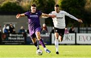 28 October 2024; Lewis Temple of Wexford in action against Dean Ebbe of Athlone Town during the SSE Airtricity Men's First Division Play-Off semi-final second leg match between Wexford and Athlone Town at Ferrycarrig Park in Wexford. Photo by Shauna Clinton/Sportsfile