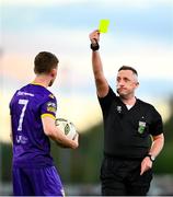 28 October 2024; Referee Alan Patchell shows a yellow card to Mikie Rowe of Wexford during the SSE Airtricity Men's First Division Play-Off semi-final second leg match between Wexford and Athlone Town at Ferrycarrig Park in Wexford. Photo by Shauna Clinton/Sportsfile