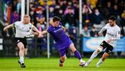 28 October 2024; Darragh Levingston of Wexford in action against Aaron Connolly, left, and Leonardo Gaxha of Athlone Town during the SSE Airtricity Men's First Division Play-Off semi-final second leg match between Wexford and Athlone Town at Ferrycarrig Park in Wexford. Photo by Shauna Clinton/Sportsfile