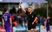28 October 2024; Referee Alan Patchell shows a yellow card to Aaron Dobbs of Wexford during the SSE Airtricity Men's First Division Play-Off semi-final second leg match between Wexford and Athlone Town at Ferrycarrig Park in Wexford. Photo by Shauna Clinton/Sportsfile