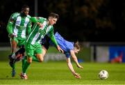 28 October 2024; Ciaran Behan of UCD in action against John O'Sullivan and Cole Omorehiomwan, left, of Bray Wanderers during the SSE Airtricity Men's First Division play-off semi-final second leg match between UCD and Bray Wanderers at UCD Bowl in Dublin. Photo by Stephen McCarthy/Sportsfile