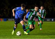 28 October 2024; Danú Kinsella Bishop of UCD in action against Max Murphy of Bray Wanderers during the SSE Airtricity Men's First Division play-off semi-final second leg match between UCD and Bray Wanderers at UCD Bowl in Dublin. Photo by Stephen McCarthy/Sportsfile