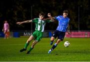 28 October 2024; Ronan Finn of UCD in action against Ben Feeney of Bray Wanderers during the SSE Airtricity Men's First Division play-off semi-final second leg match between UCD and Bray Wanderers at UCD Bowl in Dublin. Photo by Stephen McCarthy/Sportsfile
