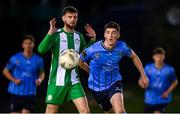 28 October 2024; Mikey Raggett of UCD and Kilian Cantwell of Bray Wanderers during the SSE Airtricity Men's First Division play-off semi-final second leg match between UCD and Bray Wanderers at UCD Bowl in Dublin. Photo by Stephen McCarthy/Sportsfile