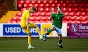 29 October 2024; Rodion Piazenko of Lithuania in action against Oisin McDonagh of Republic of Ireland during the UEFA U17 European Championships Round 1 Qualifier match between Republic of Ireland and Lithuania at Inver Park in Larne, Antrim. Photo by Ramsey Cardy/Sportsfile