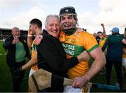 28 October 2024; Eoin Tuohy of Feakle celebrates with a supporter after the Clare County Senior Club Hurling Championship final match between Sixmilebridge and Feakle at Cusack Park in Clare. Photo by Ray McManus/Sportsfile