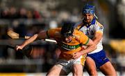 28 October 2024; Shane McGrath of Feakle is tackled by Caimin Morey of Sixmilebridge during the Clare County Senior Club Hurling Championship final match between Sixmilebridge and Feakle at Cusack Park in Clare. Photo by Ray McManus/Sportsfile