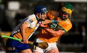 28 October 2024; Brian Corry of Sixmilebridge is tackled by Eoghan Daly of Feakle during the Clare County Senior Club Hurling Championship final match between Sixmilebridge and Feakle at Cusack Park in Clare. Photo by Ray McManus/Sportsfile