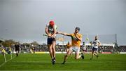 28 October 2024; Paudie Fitzpatrick of Sixmilebridge is tackled by Enda Noonan of Feakle during the Clare County Senior Club Hurling Championship final match between Sixmilebridge and Feakle at Cusack Park in Clare. Photo by Ray McManus/Sportsfile