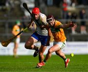 28 October 2024; Shane McGrath of Feakle is tackled by Paudie Fitzpatrick of Sixmilebridge during the Clare County Senior Club Hurling Championship final match between Sixmilebridge and Feakle at Cusack Park in Clare. Photo by Ray McManus/Sportsfile