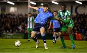 28 October 2024; Mikey Raggett of UCD in action against Cole Omorehiomwan of Bray Wanderers during the SSE Airtricity Men's First Division play-off semi-final second leg match between UCD and Bray Wanderers at UCD Bowl in Dublin. Photo by Stephen McCarthy/Sportsfile