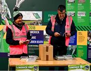 27 October 2024; Programme sellers Ger Reddan, left, and former Limerick County Board Chairman, John Cregan, during the Limerick County Premier Intermediate Hurling Championship final match between Garryspillane and Newcastle West at TUS Gaelic Grounds in Limerick. Photo by Ray McManus/Sportsfile