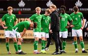 29 October 2024; Republic of Ireland manager Colin O'Brien speaks to his players after their draw in the UEFA U17 European Championships Round 1 Qualifier match between Republic of Ireland and Lithuania at Inver Park in Larne, Antrim. Photo by Ramsey Cardy/Sportsfile