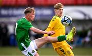 29 October 2024; Michael Noonan of Republic of Ireland in action against Jugas Turcinskas of Lithuania during the UEFA U17 European Championships Round 1 Qualifier match between Republic of Ireland and Lithuania at Inver Park in Larne, Antrim. Photo by Ramsey Cardy/Sportsfile