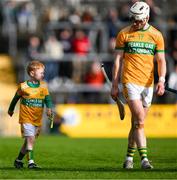 28 October 2024; Harry Hayes walks alongside Steven Conway of Feakle before the Clare County Senior Club Hurling Championship final match between Sixmilebridge and Feakle at Cusack Park in Clare. Photo by Ray McManus/Sportsfile