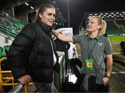 29 October 2024; Injured Republic of Ireland player Jamie Finn, left, meets teammate Diane Caldwell before the UEFA Women's EURO 2025 Play-Off Round 1 second leg match between Republic of Ireland and Georgia at Tallaght Stadium in Dublin. Photo by Stephen McCarthy/Sportsfile