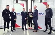 30 October 2024; BDO Ireland have announced the launch of its Economic Impact Assessment of the League of Ireland report, which highlights the league's significant contributions to economic growth and the social benefits it provides to communities across the country. The report details the league's growing impact on Ireland's national economy, local communities, and the development of both men's and women's football. Highlights include, the League of Ireland contributed  €164.7 million to the Irish economy in 2023, a significant increase from the €143 million recorded in 2022. The number of televised League of Ireland matches more than doubled from 2021 to 2023, with peak time viewership increasing by 80%. In attendance at the announcement are, from left, Ruairí Keating of Cork City, Chairman of the National League Committee Dermot Ahern, League of Ireland director Mark Scanlon, Laurie Ryan of Athlone Town, Austin Hickey, Director at BDO Ireland, and Rory Gaffney of Shamrock Rovers.   Photo by Brendan Moran/Sportsfile