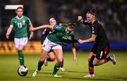 29 October 2024; Abbie Larkin of Republic of Ireland is tackled by Natia Danelia of Georgia during the UEFA Women's EURO 2025 Play-Off Round 1 second leg match between Republic of Ireland and Georgia at Tallaght Stadium in Dublin. Photo by Ben McShane/Sportsfile