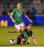 29 October 2024; Julie-Ann Russell of Republic of Ireland is tackled by Irina Khaburdzania of Georgia during the UEFA Women's EURO 2025 Play-Off Round 1 second leg match between Republic of Ireland and Georgia at Tallaght Stadium in Dublin. Photo by Stephen McCarthy/Sportsfile