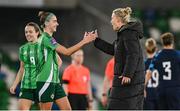 29 October 2024; Chloe McCarron and Northern Ireland manager Tanya Oxtoby after their victory in the UEFA Women's EURO 2025 Play-Off Round 1 Second Leg match between Northern Ireland and Croatia at the National Football Stadium in Windsor Park, Belfast. Photo by Ramsey Cardy/Sportsfile
