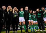 29 October 2024; Republic of Ireland players and staff, from left, STATSports analyst Claire Dunne, masseuse Debbie Lester, team operations manager Jennifer Willmott, Denise O'Sullivan, assistant coach Emma Byrne, Leanne Kiernan, Marissa Sheva, operations executive Denise McElhinney and Lily Agg after the UEFA Women's EURO 2025 Play-Off Round 1 second leg match between Republic of Ireland and Georgia at Tallaght Stadium in Dublin. Photo by Stephen McCarthy/Sportsfile