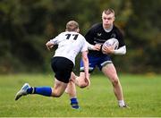 30 October 2024; Eoin Garvey of Metro in action against Darragh Deegan of Midlands during the BearingPoint Shane Horgan Cup Round 2 match between Metro and Midlands at Cill Dara RFC in Kildare. Photo by Piaras Ó Mídheach/Sportsfile