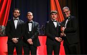 1 November 2024; Clare hurler Adam Hogan is presented with his PwC GAA/GPA All-Star Award by Uachtarán Chumann Lúthchleas Gael Jarlath Burns, right, alongside Gaelic Players Association chief executive Tom Parsons, left, and PwC partner Michael McDaid, second from left, during the 2024 PwC GAA/GPA All-Star Awards at the RDS in Dublin. Photo by Brendan Moran/Sportsfile