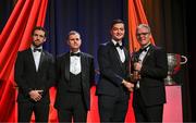 1 November 2024; Limerick hurler Kyle Hayes is presented with his PwC GAA/GPA All-Star Award by Uachtarán Chumann Lúthchleas Gael Jarlath Burns, right, alongside Gaelic Players Association chief executive Tom Parsons, left, and PwC partner Michael McDaid, second from left, during the 2024 PwC GAA/GPA All-Star Awards at the RDS in Dublin. Photo by Brendan Moran/Sportsfile