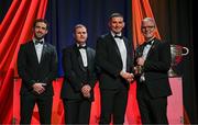 1 November 2024; Limerick Gearóid Hegarty is presented with his PwC GAA/GPA All-Star Award by Uachtarán Chumann Lúthchleas Gael Jarlath Burns, right, alongside Gaelic Players Association chief executive Tom Parsons, left, and PwC partner Michael McDaid, second from left, during the 2024 PwC GAA/GPA All-Star Awards at the RDS in Dublin. Photo by Brendan Moran/Sportsfile