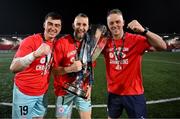 1 November 2024; Shelbourne goalkeepers Lorcan Healy, Conor Kearns and coach Paul Skinner with the SSE Airtricity Premier Division trophy after their side's victory in the SSE Airtricity Men's Premier Division match between Derry City and Shelbourne at The Ryan McBride Brandywell Stadium in Derry. Photo by Stephen McCarthy/Sportsfile