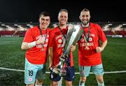 1 November 2024; Shelbourne goalkeeper Lorcan Healy, left, goalkeeping coach Paul Skinner and goalkeeper Conor Kearns celebrate with the SSE Airtricity Men's Premier Division trophy after the SSE Airtricity Men's Premier Division match between Derry City and Shelbourne at The Ryan McBride Brandywell Stadium in Derry. Photo by Stephen McCarthy/Sportsfile