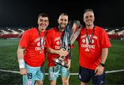 1 November 2024; Shelbourne goalkeepers Lorcan Healy, left, Conor Kearns and goalkeeping coach Paul Skinner celebrate with the SSE Airtricity Men's Premier Division trophy after the SSE Airtricity Men's Premier Division match between Derry City and Shelbourne at The Ryan McBride Brandywell Stadium in Derry. Photo by Stephen McCarthy/Sportsfile