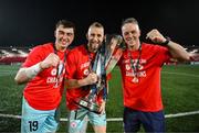 1 November 2024; Shelbourne goalkeepers Lorcan Healy, left, Conor Kearns and goalkeeping coach Paul Skinner celebrate with the SSE Airtricity Men's Premier Division trophy after the SSE Airtricity Men's Premier Division match between Derry City and Shelbourne at The Ryan McBride Brandywell Stadium in Derry. Photo by Stephen McCarthy/Sportsfile