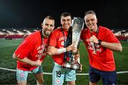 1 November 2024; Shelbourne goalkeepers Conor Kearns, left, Lorcan Healy and goalkeeping coach Paul Skinner celebrate with the SSE Airtricity Men's Premier Division trophy after the SSE Airtricity Men's Premier Division match between Derry City and Shelbourne at The Ryan McBride Brandywell Stadium in Derry. Photo by Stephen McCarthy/Sportsfile