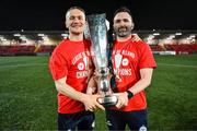 1 November 2024; Shelbourne physiotherapist Rory Byrne, left, and team doctor Anthony Hoban celebrate with the SSE Airtricity Men's Premier Division trophy during the SSE Airtricity Men's Premier Division match between Derry City and Shelbourne at The Ryan McBride Brandywell Stadium in Derry. Photo by Stephen McCarthy/Sportsfile Photo by Stephen McCarthy/Sportsfile