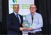 5 November 2024; Karl Dunne, CEO of Ireland Action, presents Liam Cunningham from Athlone RSC, with the award for Community Engagement Initiative of The Year in the Leisure, Health and Fitness Industry, during the 2024 National Quality Standard Awards ceremony at the Killashee Hotel in Naas, Kildare. Photo by Matt Browne/Sportsfile