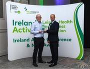 5 November 2024; Karl Dunne, CEO of Ireland Action, presents Liam Cunningham from Athlone RSC, with the award for Community Engagement Initiative of The Year in the Leisure, Health and Fitness Industry, during the 2024 National Quality Standard Awards ceremony at the Killashee Hotel in Naas, Kildare. Photo by Matt Browne/Sportsfile