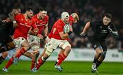 2 November 2024; Fineen Wycherley of Munster makes a break during the match between Munster and All Blacks XV at Thomond Park in Limerick. Photo by Brendan Moran/Sportsfile