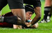 2 November 2024; Mike Haley of Munster scores his side's first try despite the tackle of Kini Naholo of All Blacks XV during the match between Munster and All Blacks XV at Thomond Park in Limerick. Photo by Brendan Moran/Sportsfile