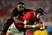 2 November 2024; Mike Haley of Munster is tackled by Kini Naholo of All Blacks XV on the way to scoring his side's first try during the match between Munster and All Blacks XV at Thomond Park in Limerick. Photo by Brendan Moran/Sportsfile