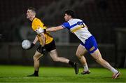 2 November 2024; Caolan Ward of St Eunan's in action against Joe Oguz of Errigal Ciarán during the AIB Ulster GAA Senior Club Football Championship Round 1 match between Errigal Ciarán and St Eunan's at O'Neill's Healy Park in Omagh, Tyrone. Photo by Ben McShane/Sportsfile