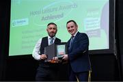 5 November 2024; John Windle, Chairperson of Ireland Action, presents the Award for Hotel Leisure Awards to Station House Hotel and Leisure Centre during the 2024 National Quality Standard Awards ceremony at the Killashee Hotel in Naas, Kildare. Photo by Matt Browne/Sportsfile